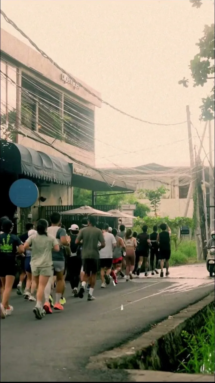 Community runners on a Bali road